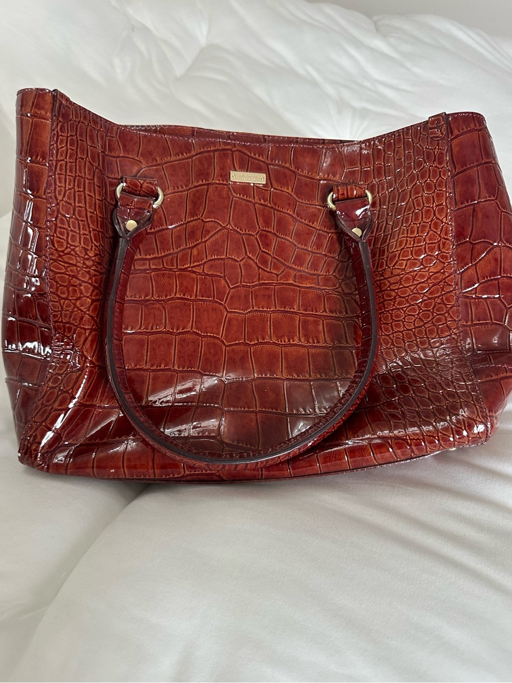 Kate Spade Burgundy crocodile skin texture handbag